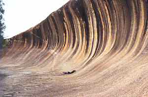 Bill surfs Wave Rock